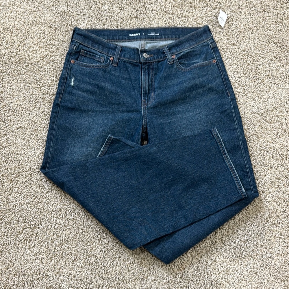 Women’s mid-rise boyfriend loose denim jeans. Size 8